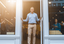 Five Smart Ways to Boost Your Website ROI in 2025 Small business owner welcoming customers.